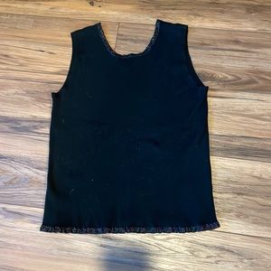 Vintage black with red and green around collar. Large women’s sleeveless top.